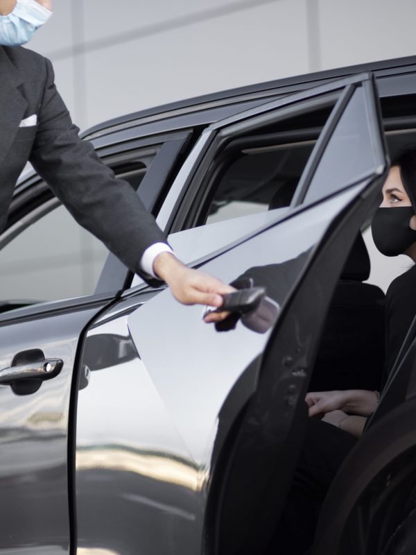 young-male-being-uber-driver-female-clientrrf